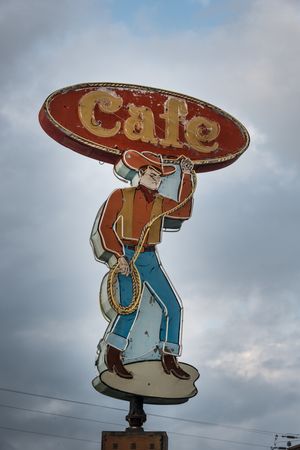 Cafe advertising sign on the road from Johnson City to Kerrville, Texas