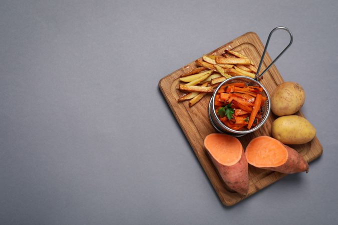 Concept of tasty food, fried sweet potato, space for text