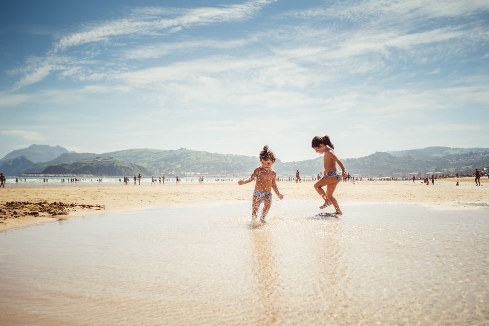 little girls by the seashore