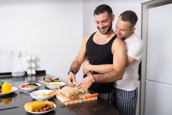 Cute male couple preparing food for a healthy meal