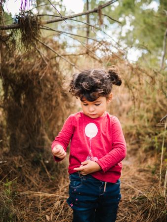 portrait small girl in forest