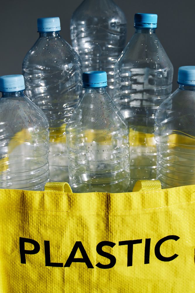 Plastic bottles in bag prepared for recycling