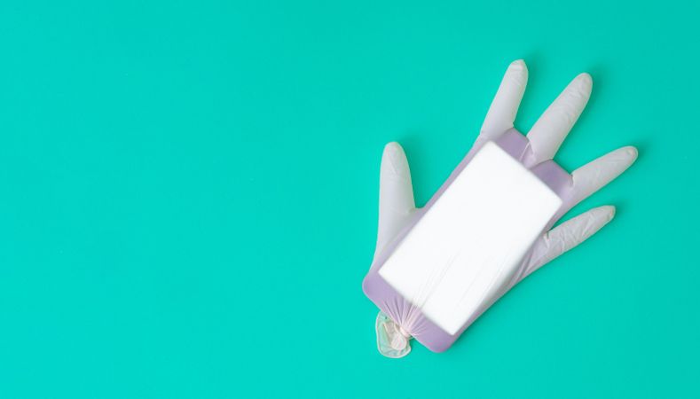 Surgical latex glove and mobile phone