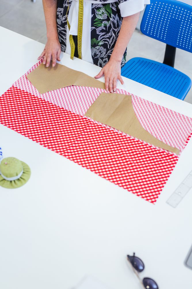 Woman in a sewing school