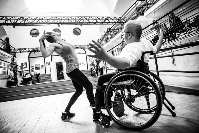 MONTREAL, QUEBEC, CANADA – March 16 2019- A man in a wheelchair in a dance class with a woman