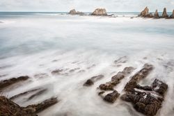 Wonderful ocean rocky coast in fair weather