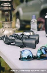 Close up of binoculars on camping table 5aXOVo