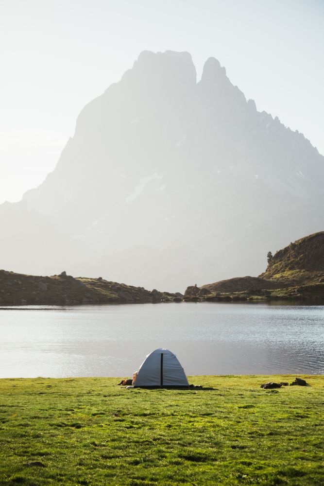 Majestic mountain landscape with tourist tent