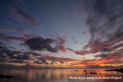 Vast purple and orange sky over the Indian Ocean 5nqAZ0