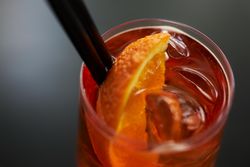 Close up of cocktail with orange slice