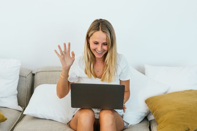 Cheerful woman having video call