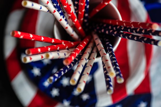 Close up of American flag plates, napkins and straws