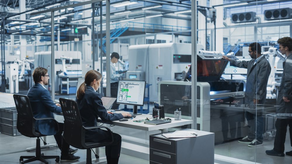 Man and woman working in tech office