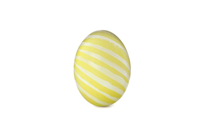 Decorative easter egg isolated on light background. Festive tradition