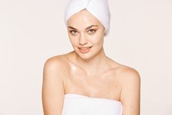 female with radiant body after cosmetic procedure