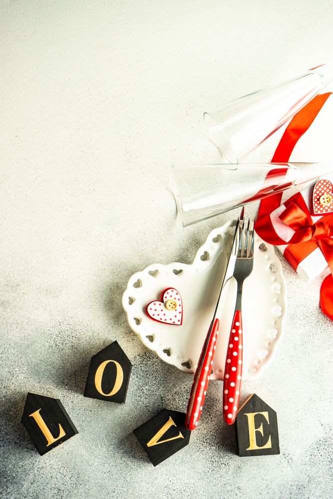 Valentine's Day themed dinner setting with heart shaped plate