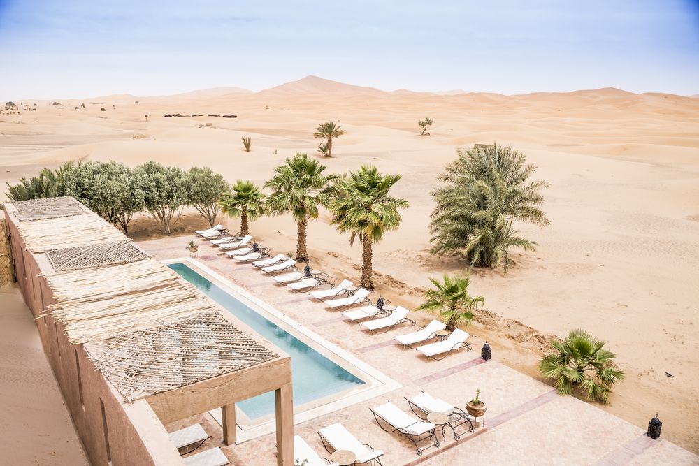 Poolside of exotic hotel in desert