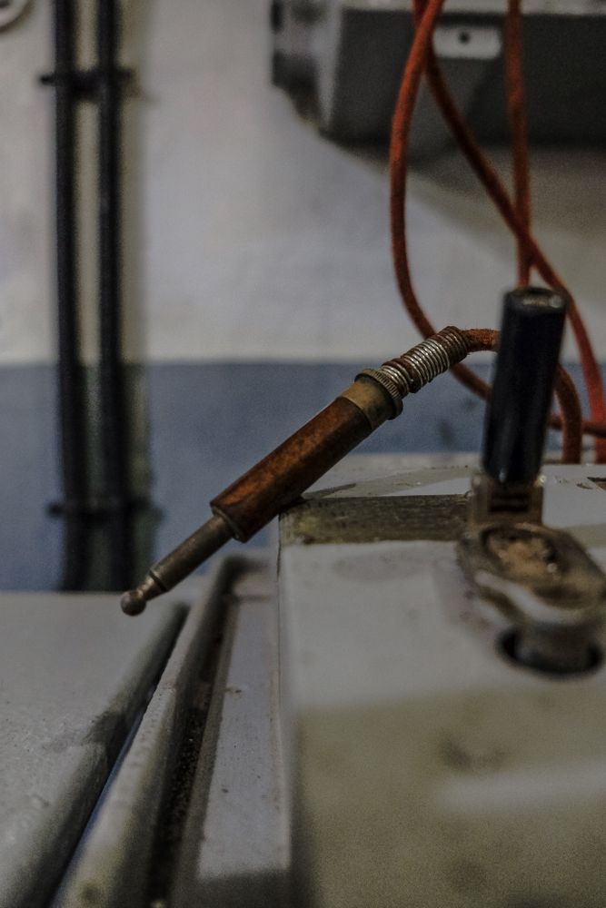 Old 1/4 inch plug on switchboard in museum display