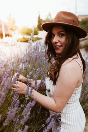 Woman with mysterious smile looking at camera