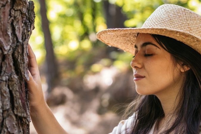 Woman enjoying a day in nature in the forest