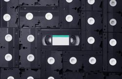 VHS Cassettes one facing opposite all others