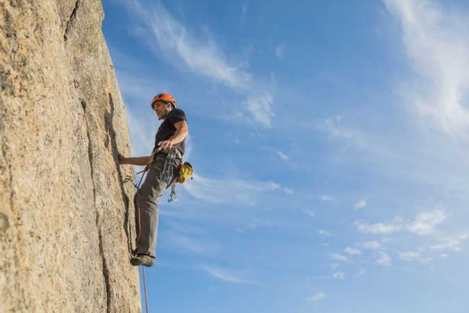 Man climbing a rock