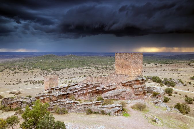Ancient rocky fort in stormy landscape