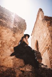 female in ruins of old castle