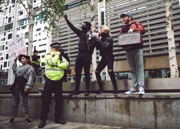 London, England, United Kingdom - June 6th, 2020: Group of people at BLM protest with police