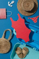 Suitcase with summer things, summer vacation concept.