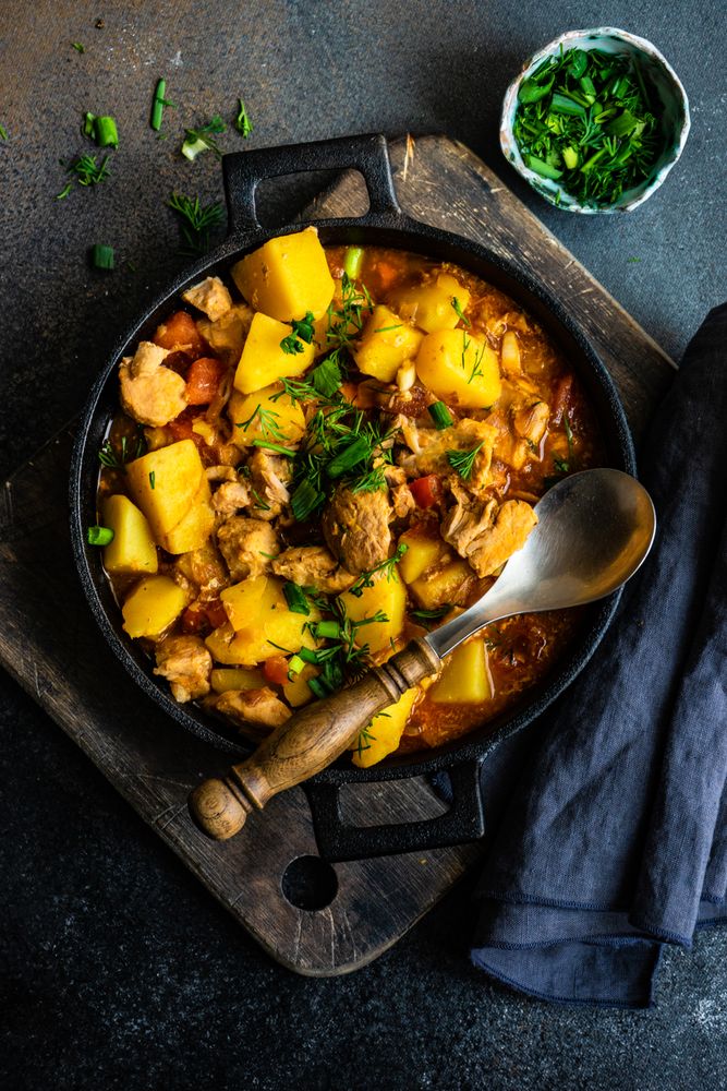 Georgian meat and vegetable dish Souzi served in pot with herb