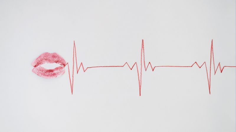 Kiss with ekg line coming out of it