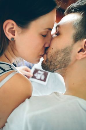 Top view of kissing couple