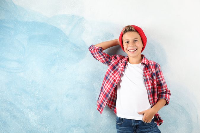 Fashion boy on color background, space for text