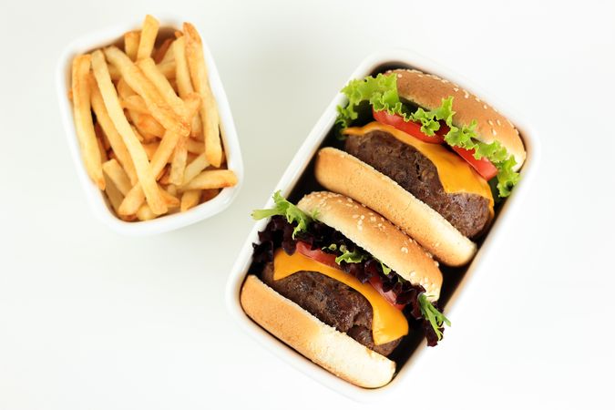 Homemade Burgers with Beef, Tomato, Cheese, and Lettuce.