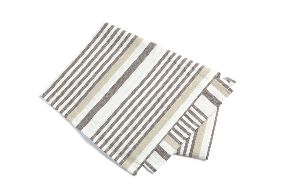 Folded fabric napkin isolated on plain background