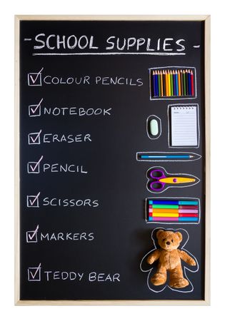 School supplies over chalkboard background