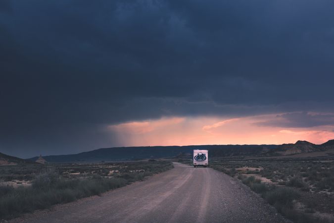 Trailer standing on side of empty road