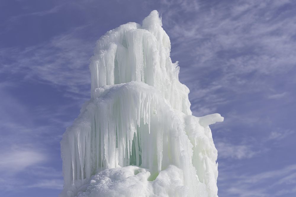 Ice structure against a blue sky