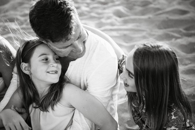 Beautiful happy family with children on beach