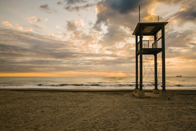 Observation tower at empty seashore