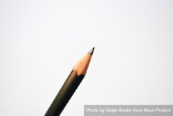 Close up of sharpened pencil in center of picture with copy space 5r9qrd