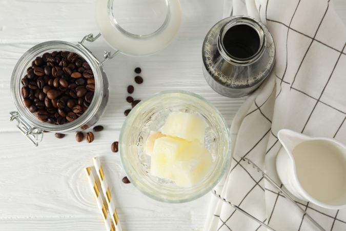 Composition with ice coffee on wooden background