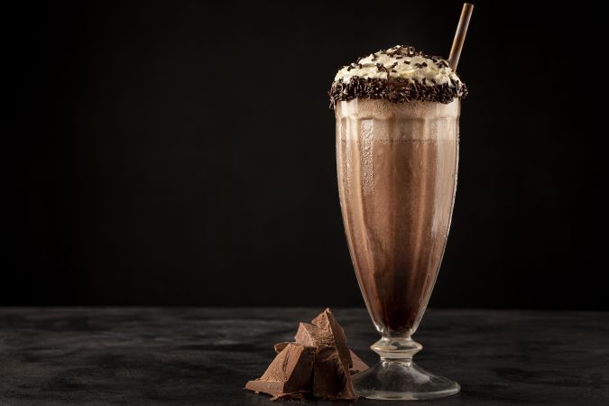 Chocolate milkshake with whipped cream.