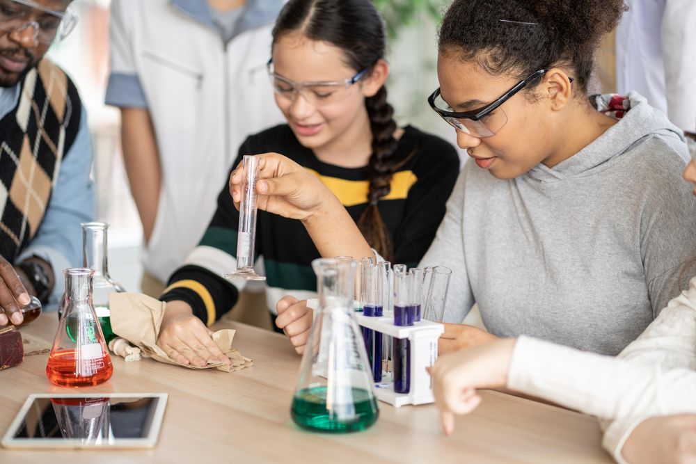 Students in science class with protective eye wear