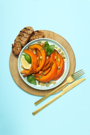 Concept of tasty homemade dish - baked pumpkin