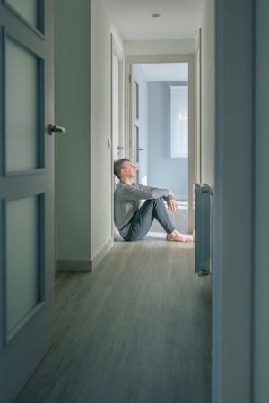 Man sitting on the floor