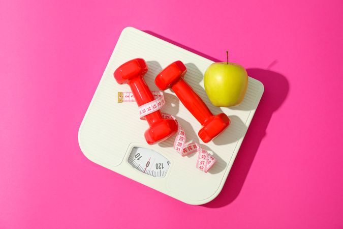 Flat lay composition with loss weigh accessories on color background