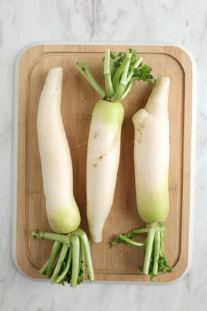 Radish on Wooden Chopping Board