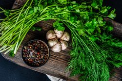Breadboard with seasonings and aromatics